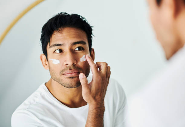 cbd for skin care, cbd skincare, cbd in skincare, cbd mens skincare, man applying cream, lotion and moisturizer for a skincare routine,